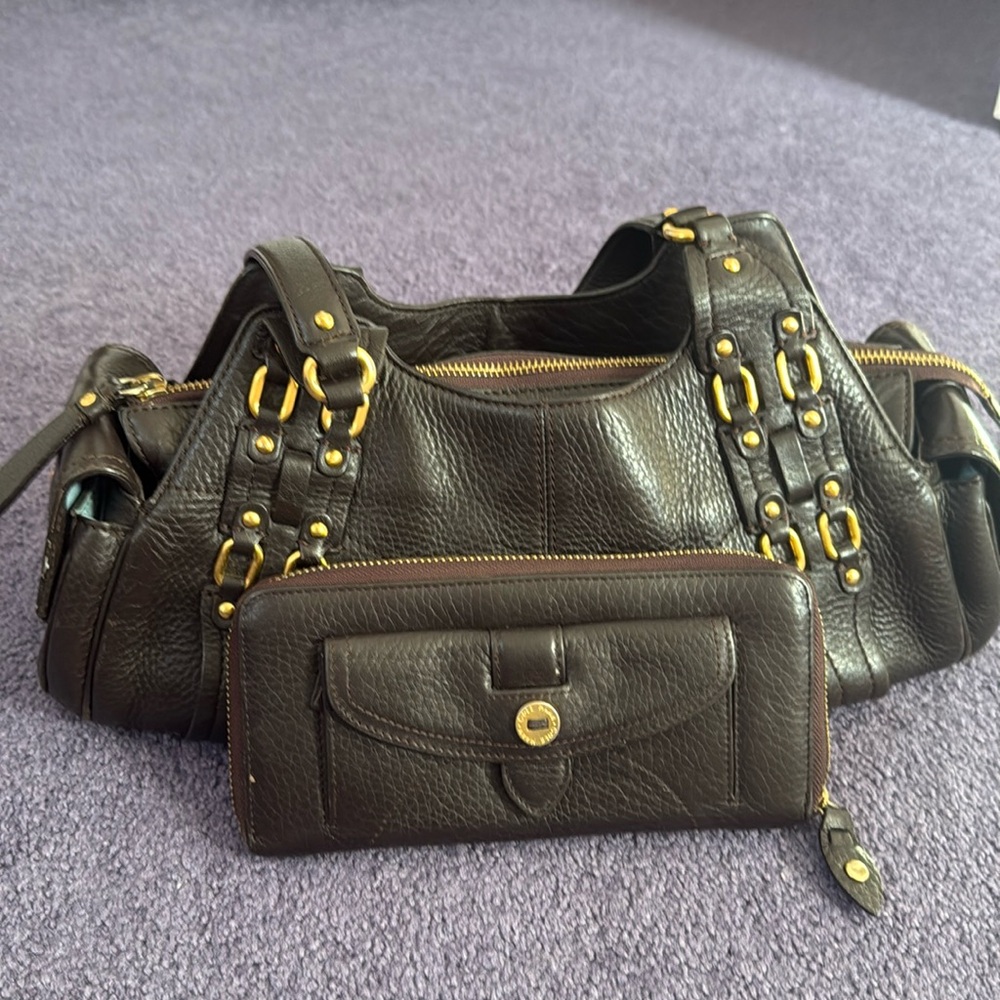 Good condition Cole Haan chocolate brown baguette back with matching wallet